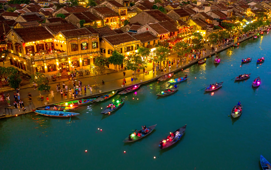 Explore the beauty and charm of Hoi Ans ancient town. An experienced traveler will tell you that it’s a must-see destination filled with historic secrets, unique architecture - family trip to vietnam