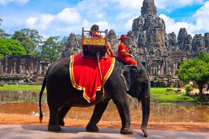  Riding elephants in Siem Reap