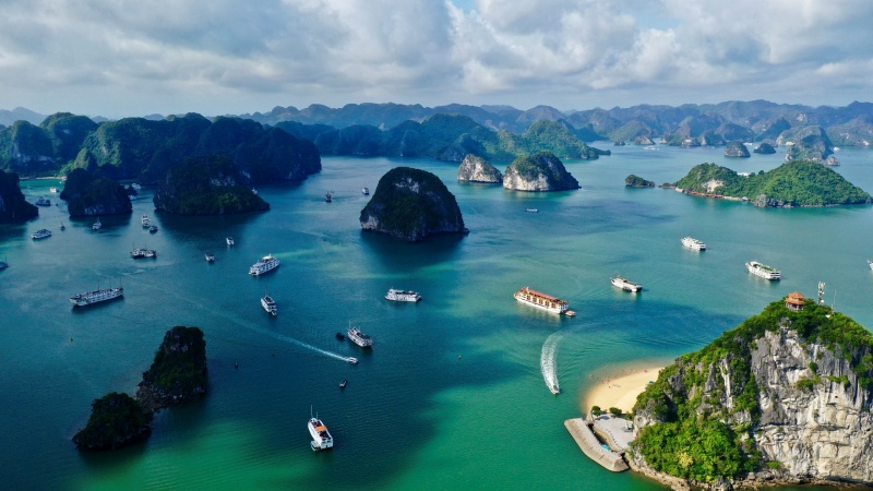 Cruise around HaLong Bay to see a wide variety of grottos, caves and islets