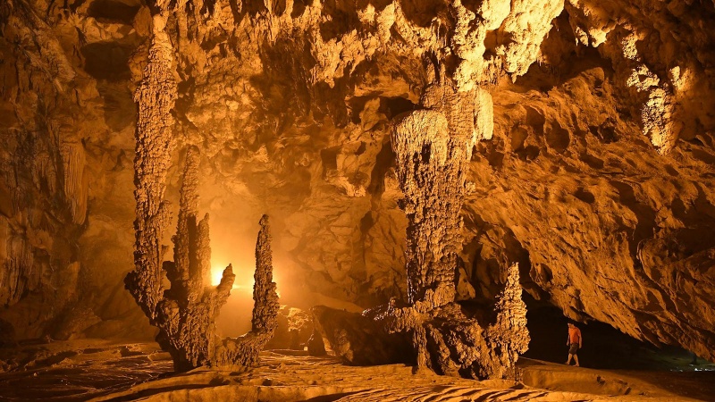 Admire the beautiful limestone formations in Nguom Ngao cave