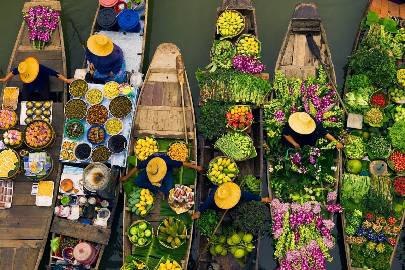 Shop different kinds of goods at the floating markets in Mekong Delta