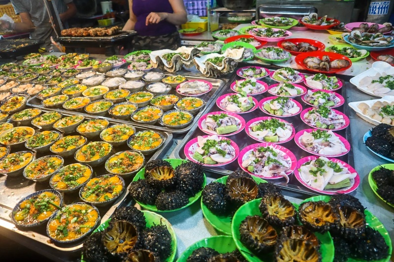 Try different street food at the night market during Phu Quoc tours