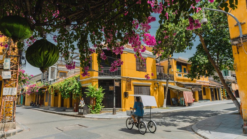 Travel to Hoi An for the beauty of its streets, architecture and history - guaranteed to take your breath away - best places to go in Vietnam
