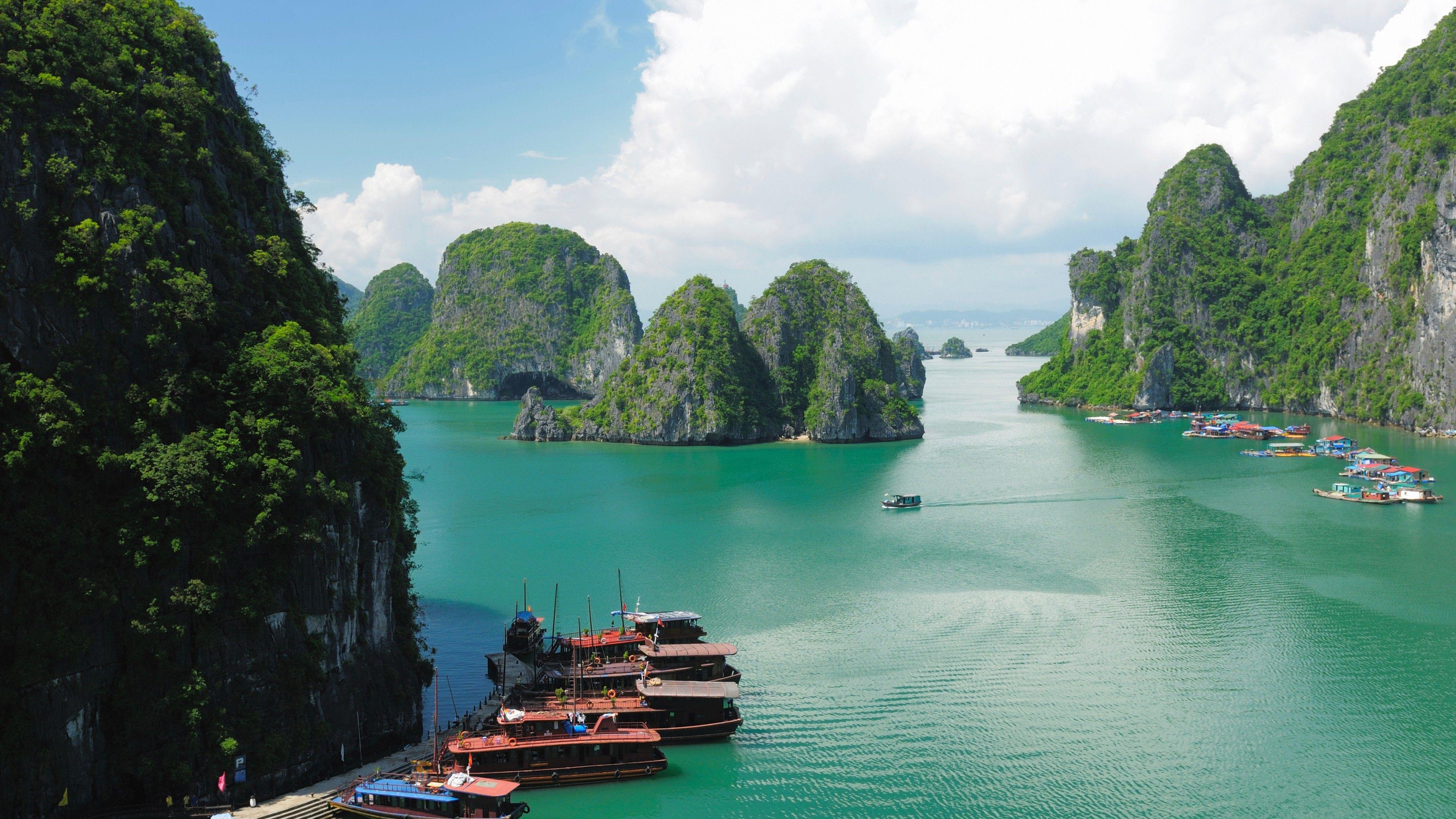Escape to the beauty of Ha Long Bay and explore its crystal clear waters and unique grottos