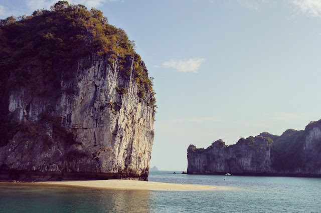 Embark on an unforgettable adventure to Lan Ha Bay, where crystal clear waters and towering limestone cliffs await