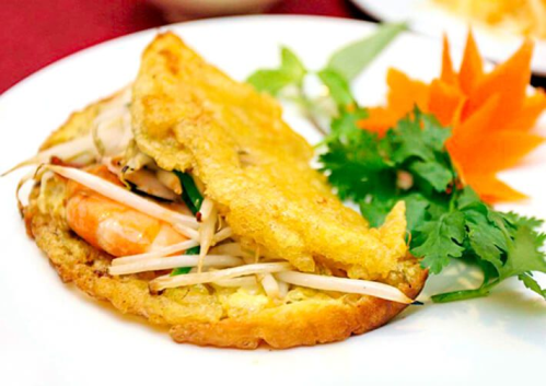 Come explore the vibrant streets of Hue and tantalize your taste buds with their heavenly Banh Khoai - hue food tour