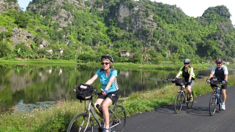 Take a journey and explore the beauty of Ninh Binh by hopping on a bike and making your way through the stunning countryside