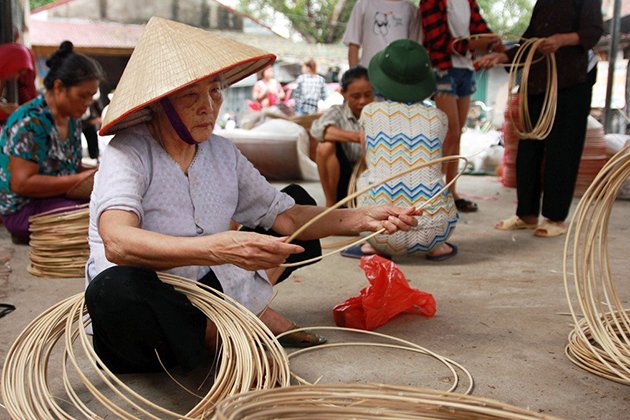 Explore the history and culture of Vietnam through a visit to Chuong Conical Hat village