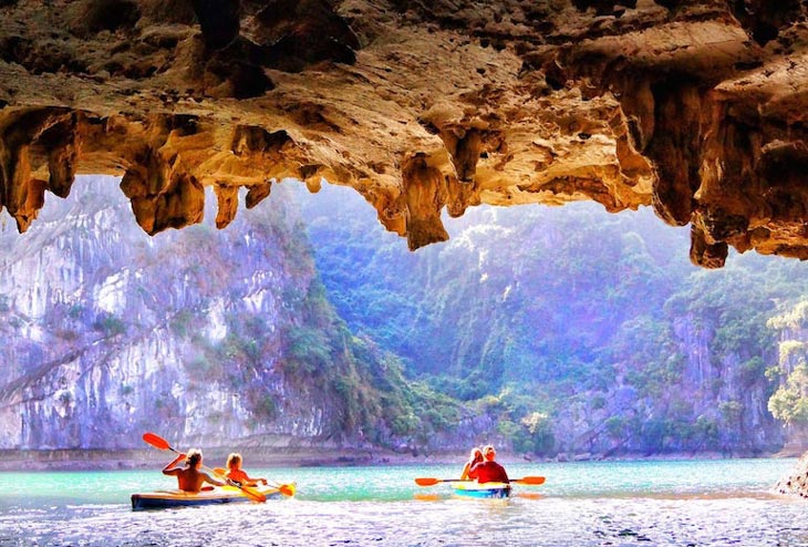 Let your worries drift away in the tranquil waters of Ha Long Bay as you explore its beauty from the seat of a kayak - Ha Long Bay in Vietnam