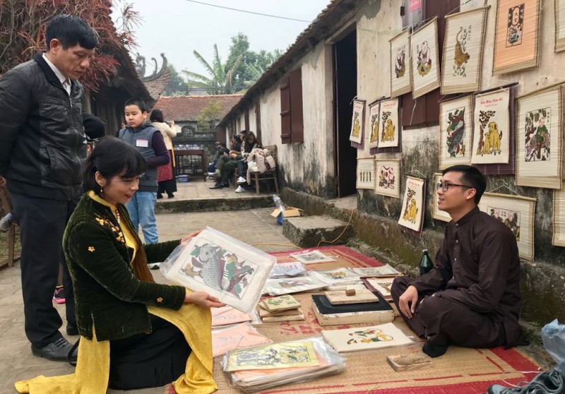 Discover a world where art comes alive, Take a journey into Dong Ho Painting Village and explore the vivid and intricate traditional Vietnamese artwork created by local artists