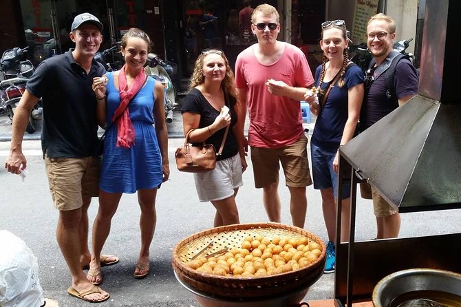 Soak in the sights and sounds of this vibrant city while enjoying delicious local specialties to tantalize your taste buds - hanoi food tour