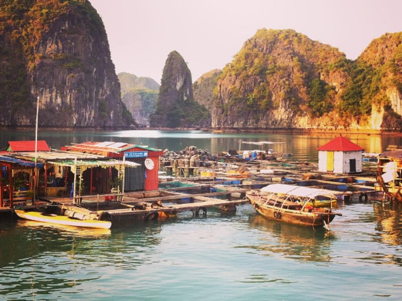 Let this breathtaking view of Halong Bays floating village take you to a world of wonder