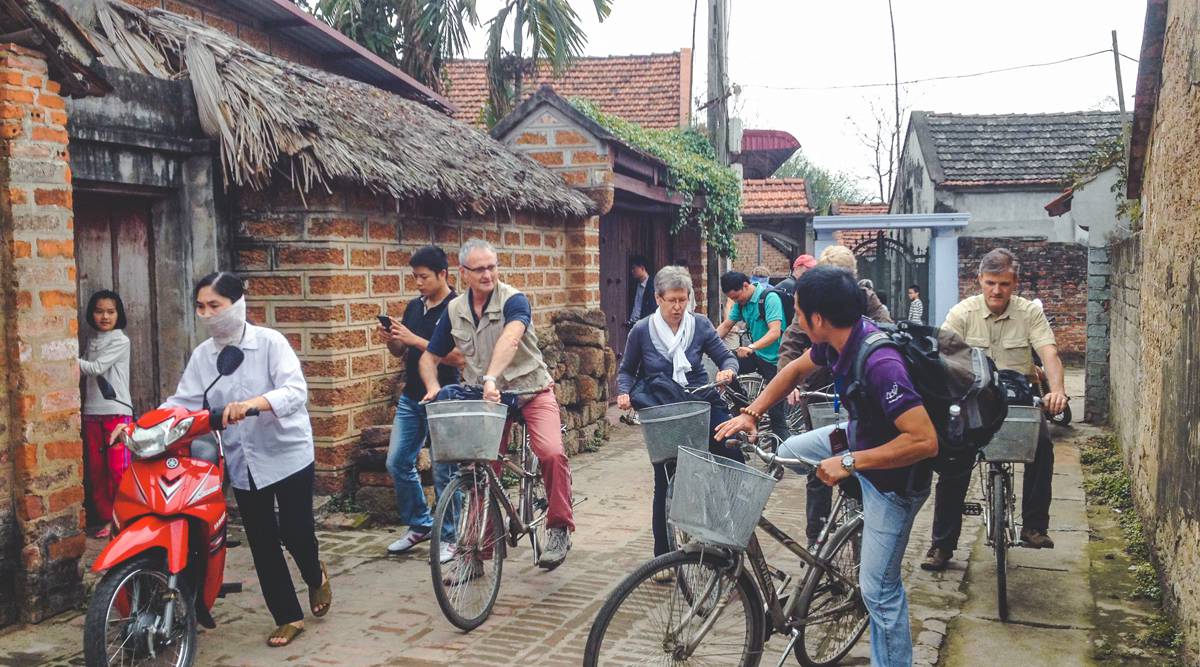 Explore the past as you experience Duong Lam Ancient Village on two wheels
