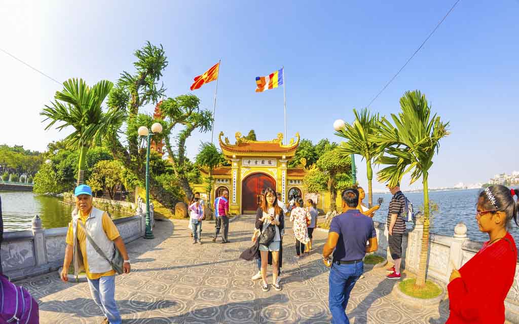 Take a moment to be thankful for the beauty of life and nature at Tran Quoc Pagoda in Hanoi