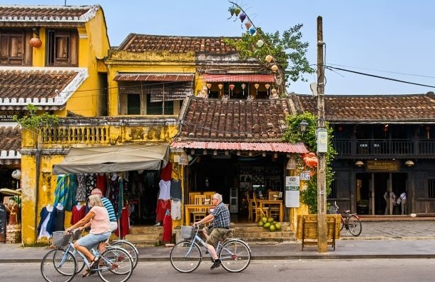 Exploring the ancient streets of Hoi An is best done on two wheels - vietnam adventure tour