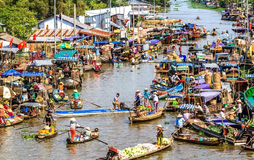 Take a deep dive into the unique culture of Vietnam - explore the floating markets of Mekong Delta Vietnam