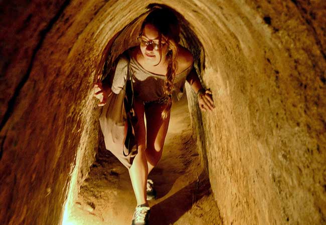 Take a walk through history and explore the incredible Cu Chi Tunnels - city tour in ho chi minh