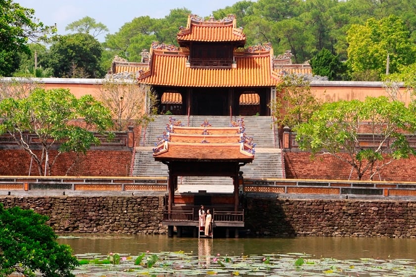 Enter the world of romance and serenity at the Tomb of Tu Duc in Hue With its enchanting lakes, lush gardens, and intricate architecture, this poetic sanctuary will awaken the dreamer within you - Tu Duc Tomb