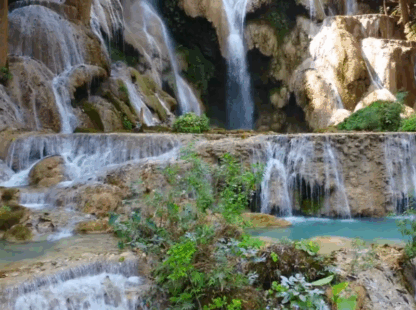 Boat Trip to Pak Ou Caves – Kuang Si Waterfall – Hanoi